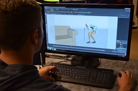 Student at computer working on animation